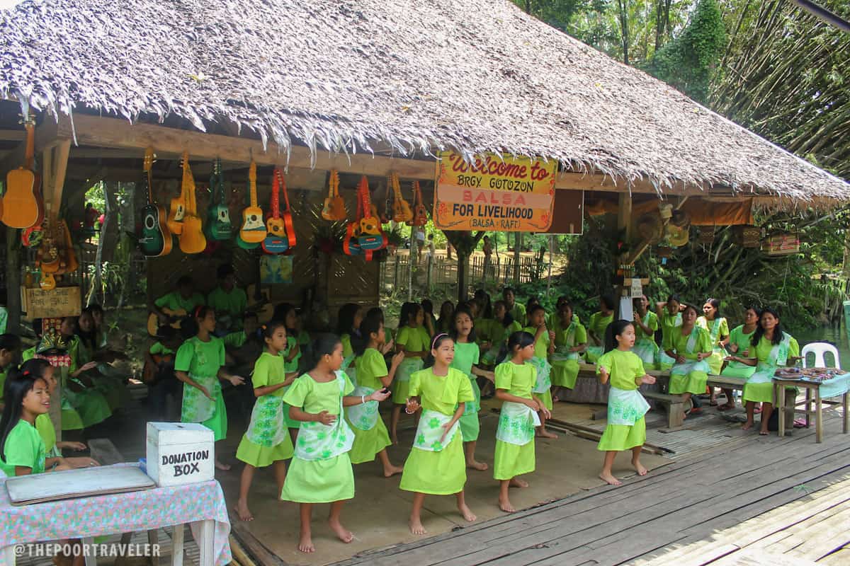 Members of the community performing Filipino songs and dances