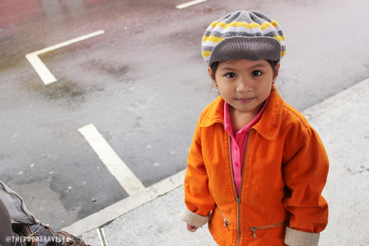 My niece posing for the camera while waiting for the bus. Hong Kong locals kept on talking with her and telling us how cute she was!