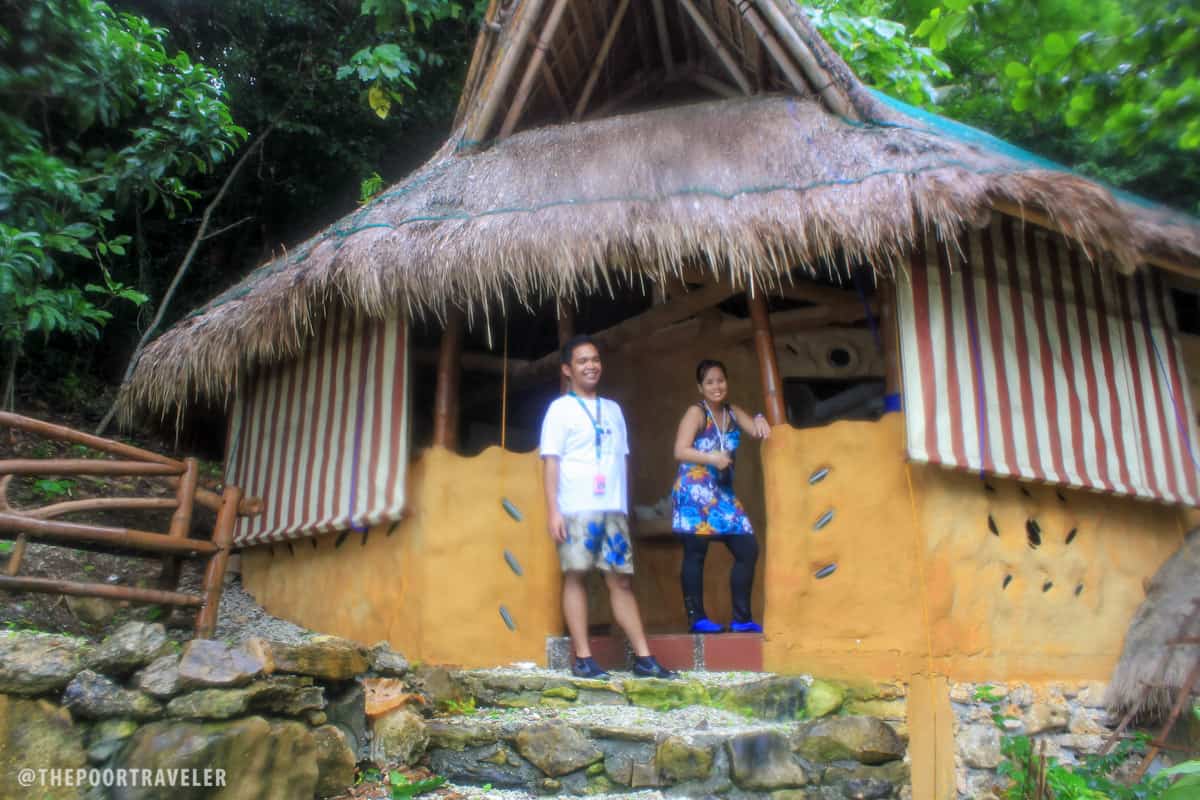 My friends Ronnie and Celine inside a mud house