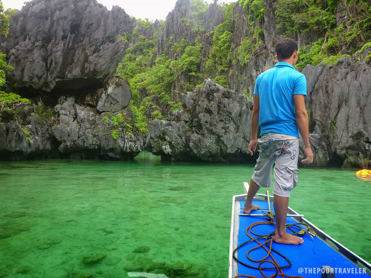 The gap to swim or kayak through to penetrate Small Lagoon. And that's our boatman.