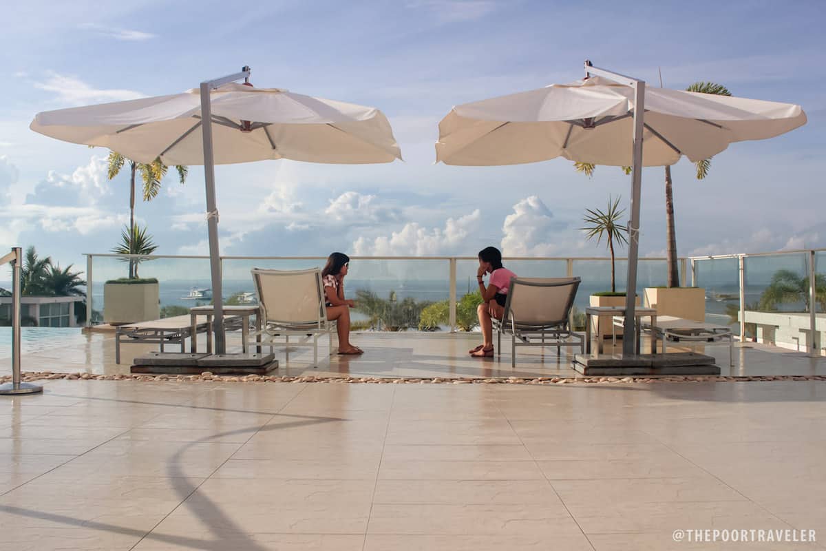 My friends April and Chichi by the pool