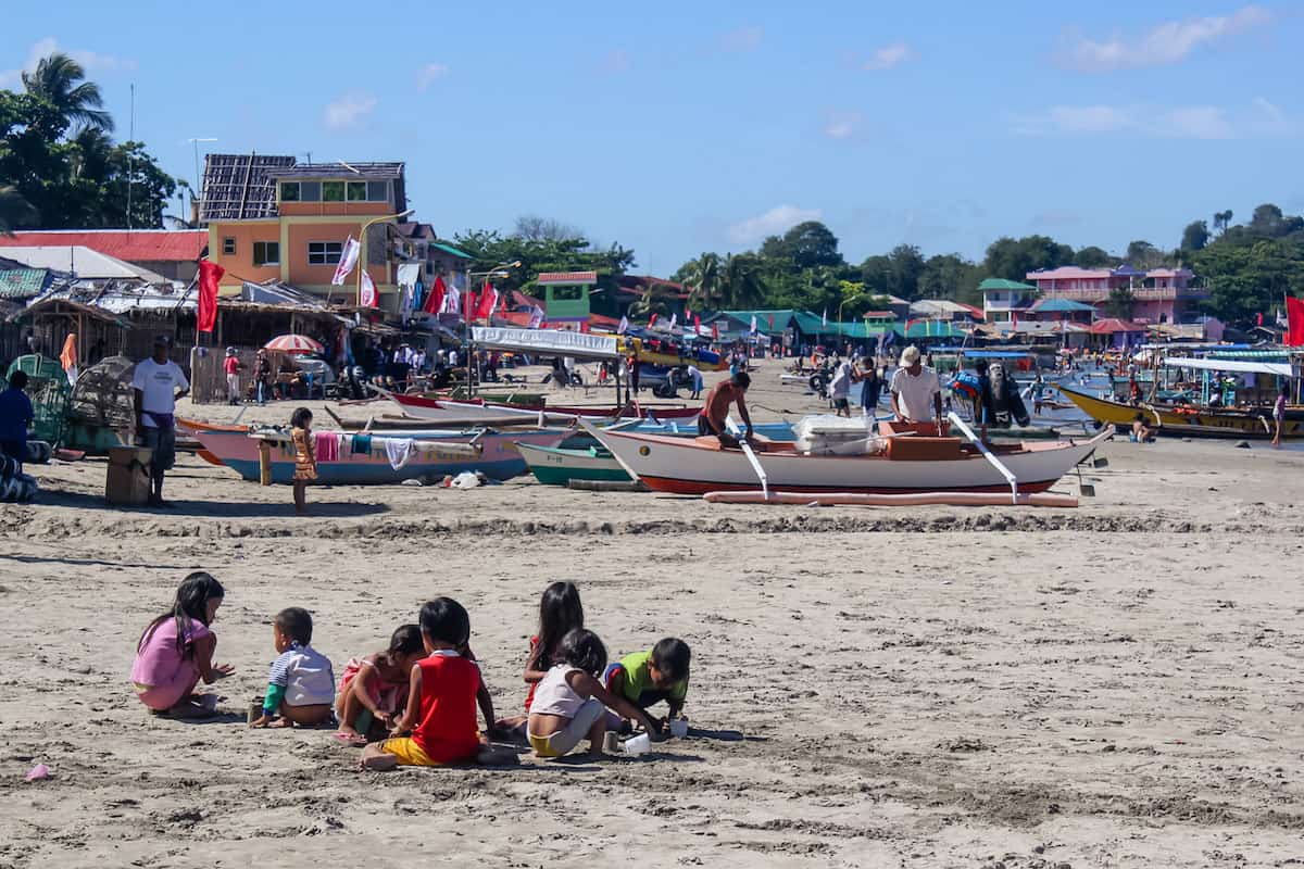 Children building sand castles