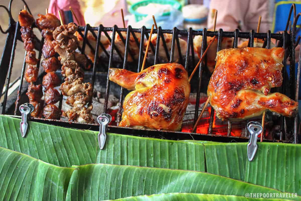 Grilled chicken tail, gizzard, and legs sold in the streets of Silom