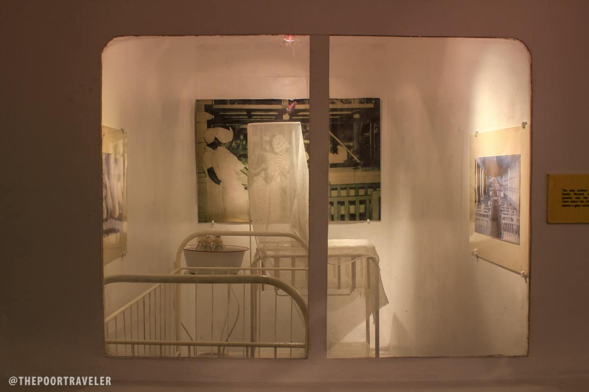 A replica of the nursery. Babies were immediately separated from their leper parents, who could only see them through a glass window.