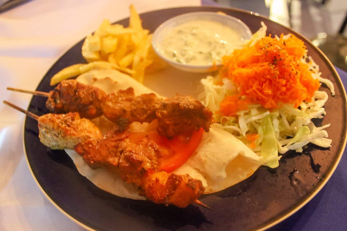 Souvlaki (P160) pork cuts grilled on a skewer, served with tzatziki (yoghurt sauce), cabbage salad, and potato fries. The meat isn't dry and overcooked and the dip complimented it well.
