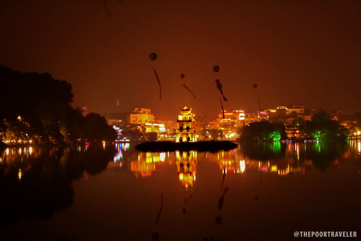 Glowing Lake: The Turtle Tower and Hoan Kiem Lake at night