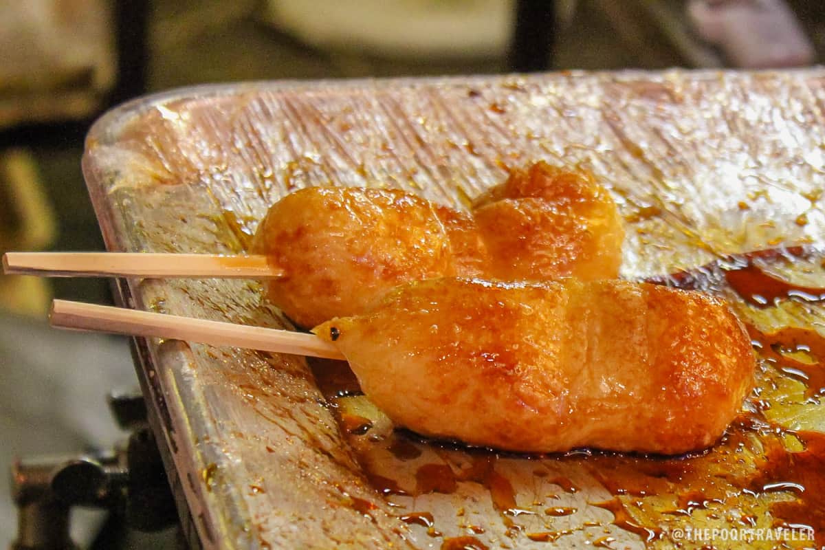 Mitarashi Dango. Barbequed rice on stick. Sweet and very filling!