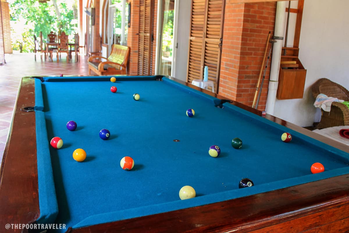 A billiards table by the garden