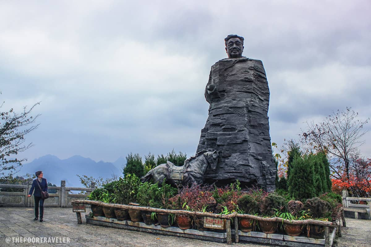 Marshal He Long Park. Named after the legendary military leader, the park has a massive statue of him as its centerpiece. "The statue looks like the peculiar peaks in Wulingyuan," reads the marker. By his side is his horse, symbolizing the glory of his military life.