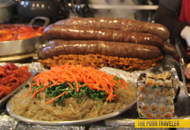 That weird sausage in the background is , cow intestines stuffed with pig's blood among others