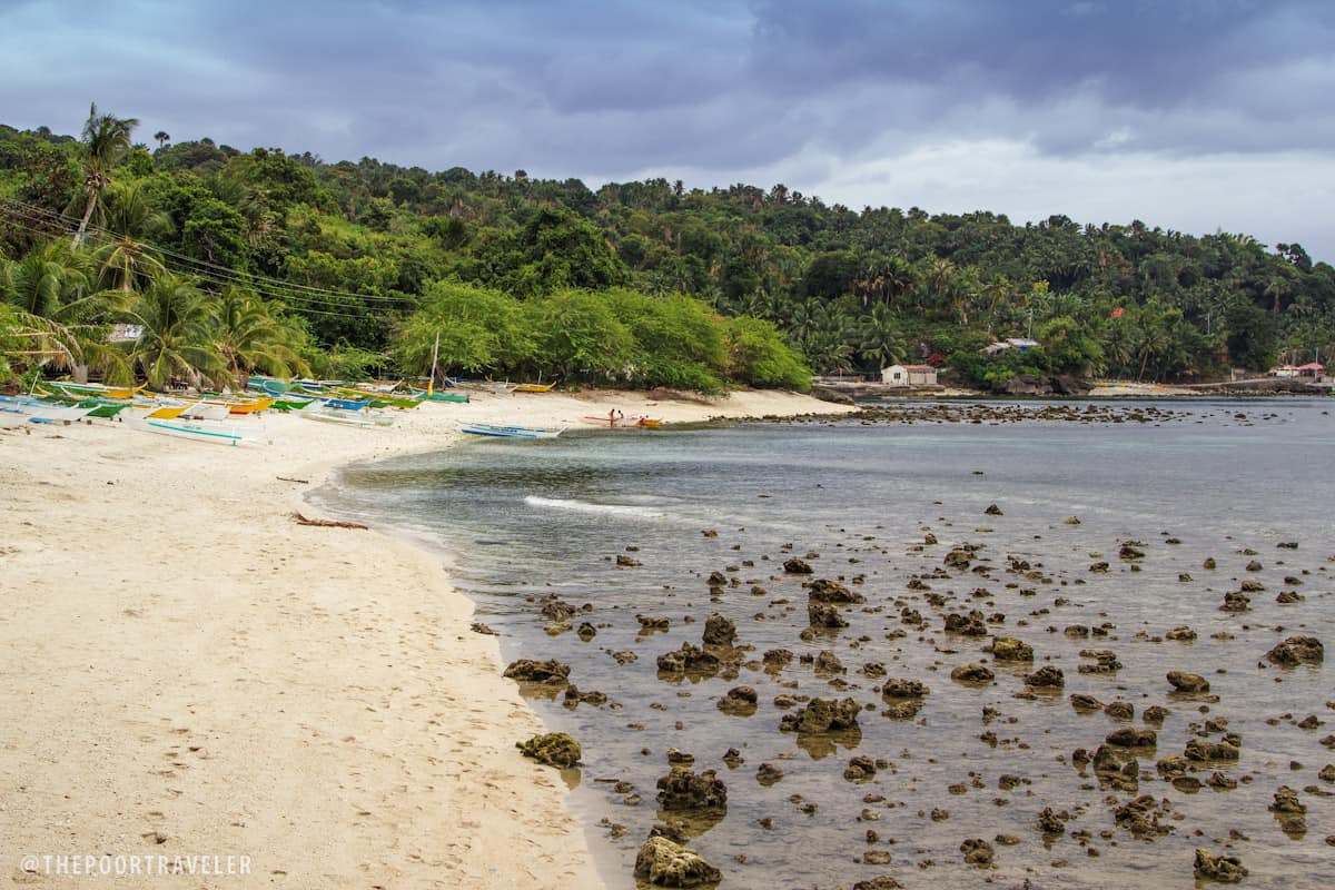 Another pocket of sand behind a cliff in Masasa Beach