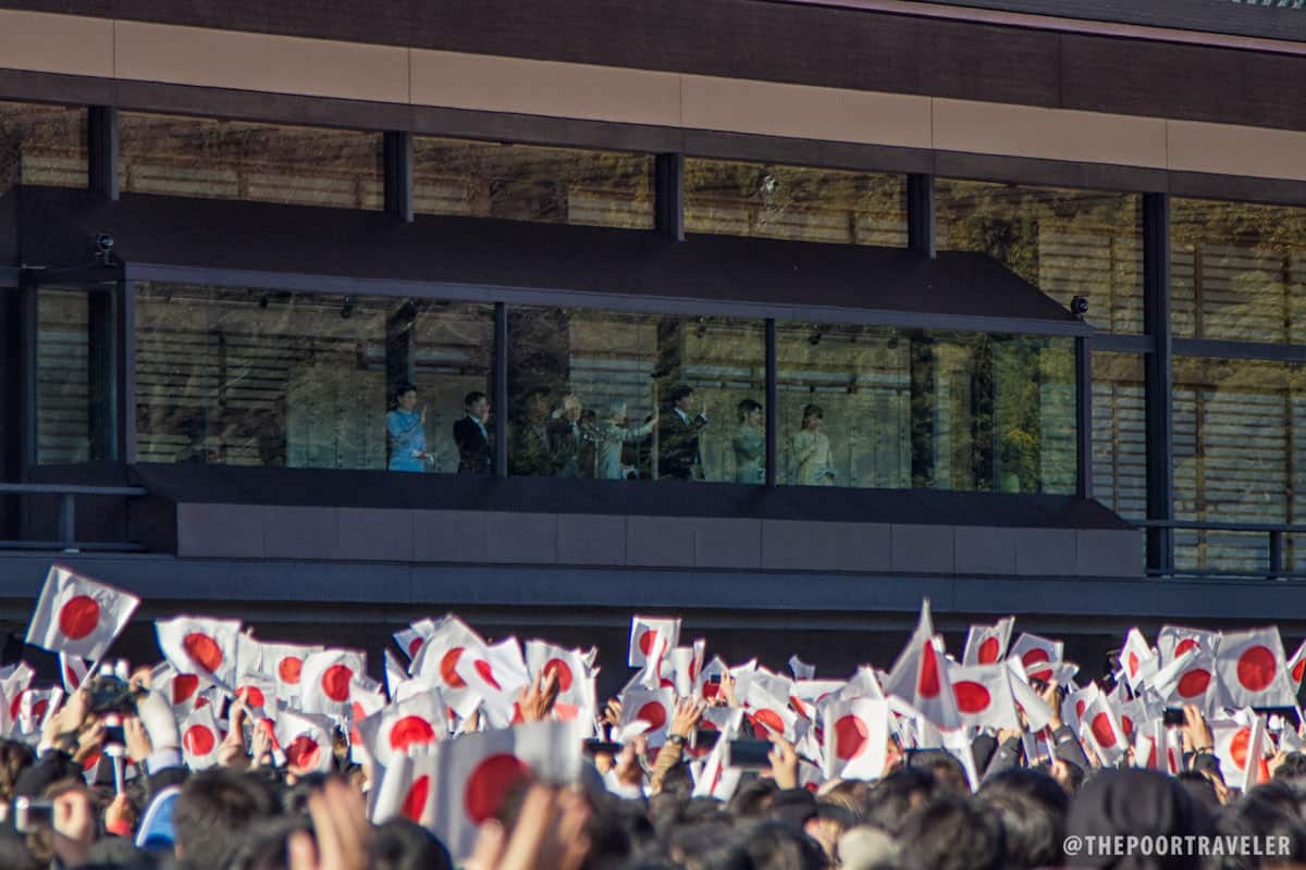 Japanese flags waved instantly when the Emperor appeared.