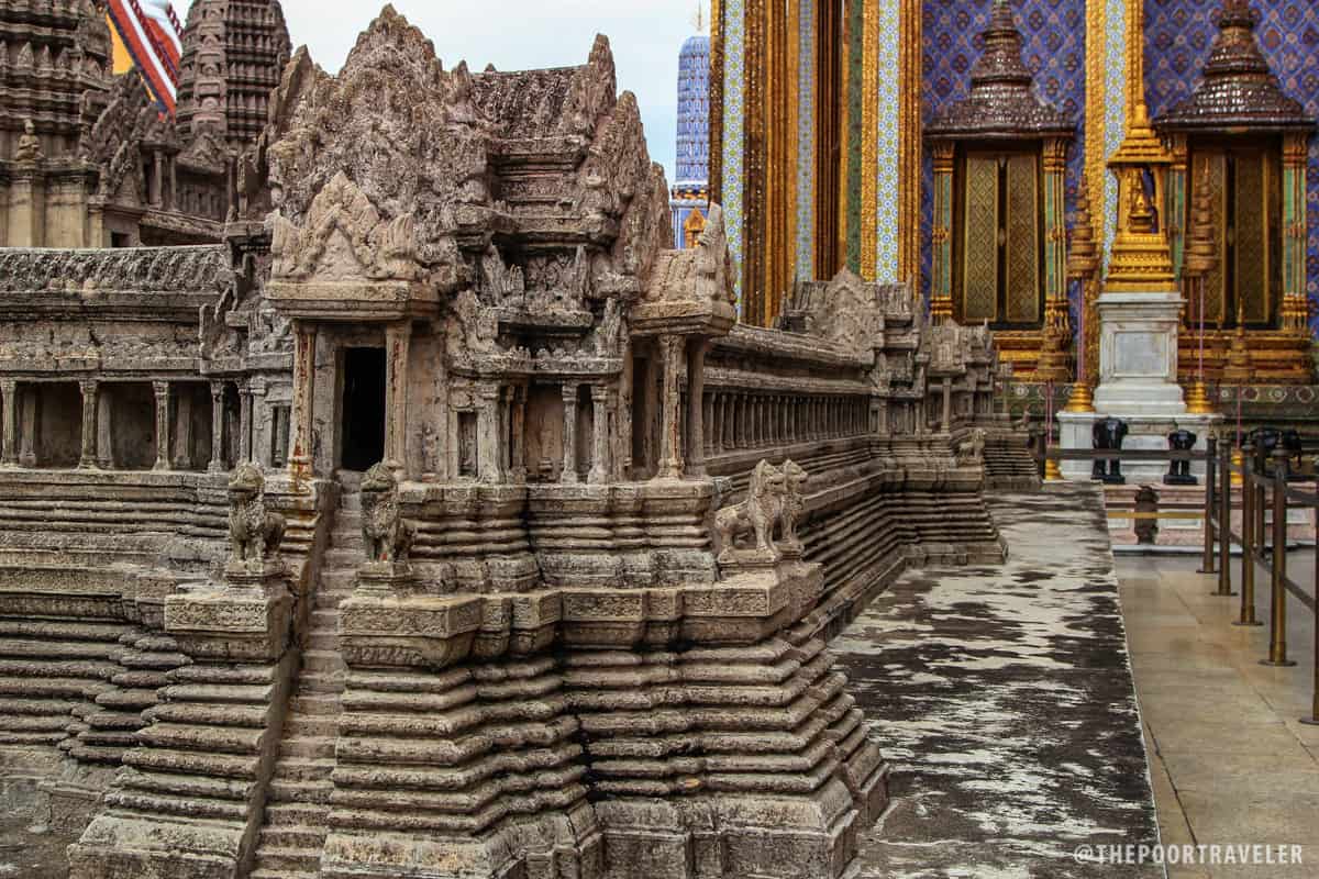 A miniature model of Angkor Wat can be found behind a chedi at the Temple of the Emerald Buddha.