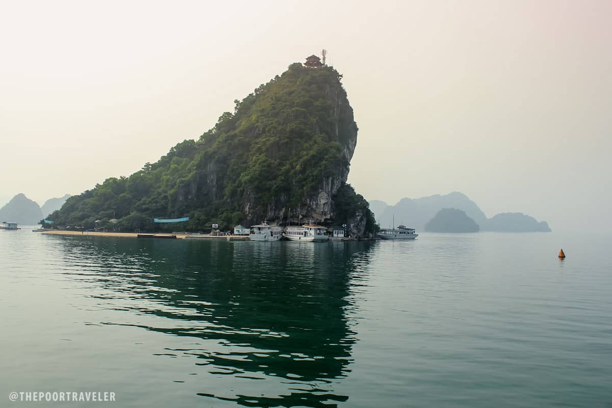 Ti Top Island. On top of that cliff is a pagoda which serves as a viewpoint for tourists.