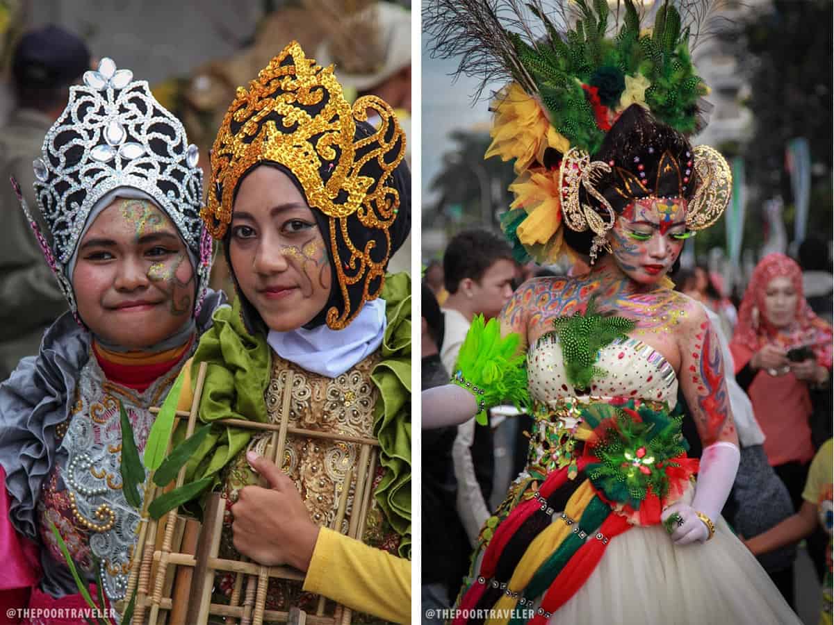 Asia Africa Parade participants in vibrant, elaborate costumes.