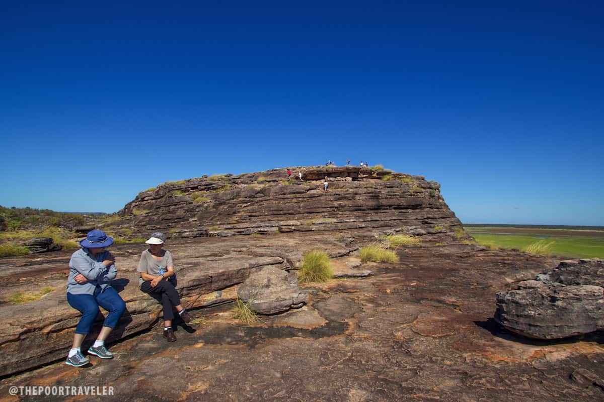 Two ladies taking a rest before climbing to the top.