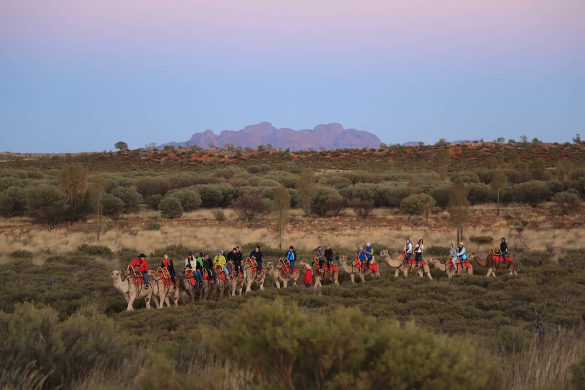 The Kata Tjuta rising in the background