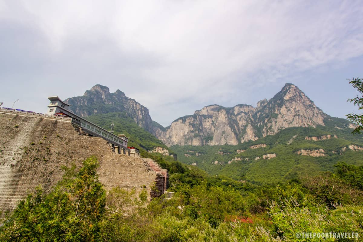 That building atop the cliff is the end of the trail.