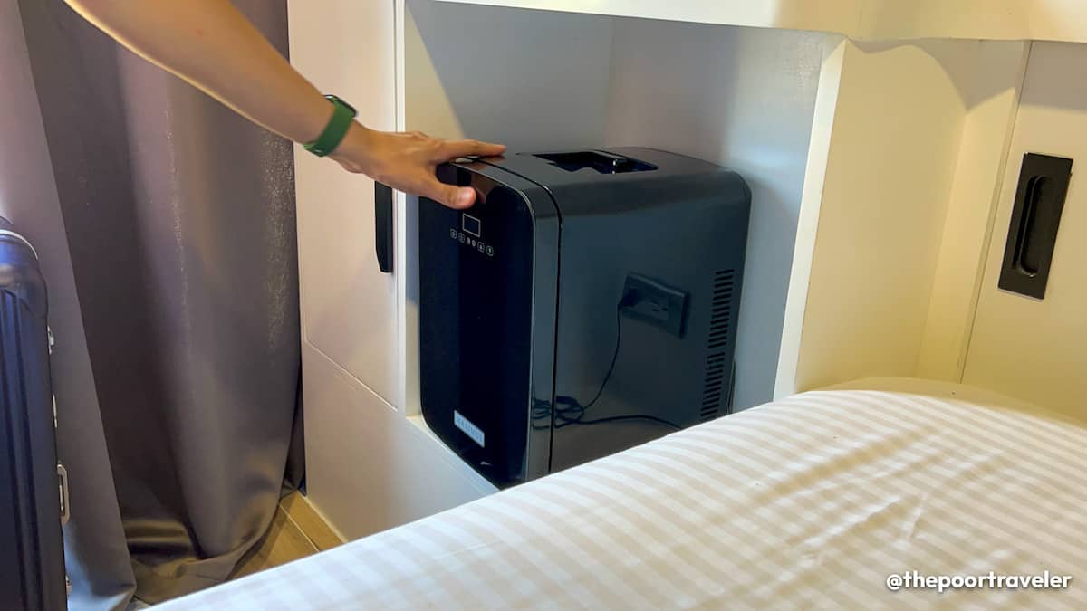 Small refrigerator with complimentary bottled water inside